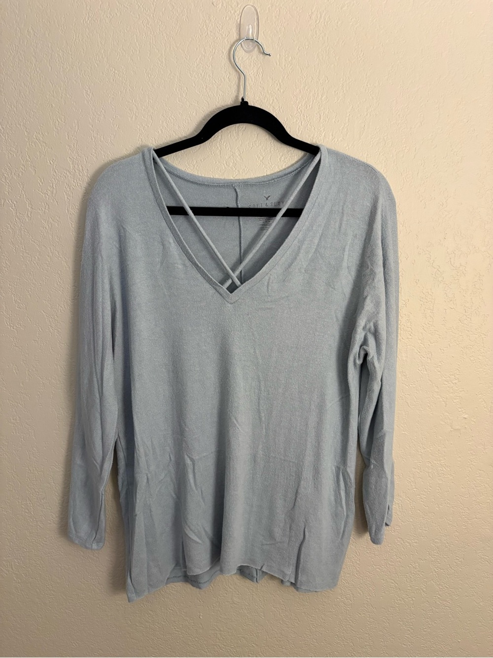 Light Blue V-Neck Long-Sleeve Women's Top with Strappy Detail